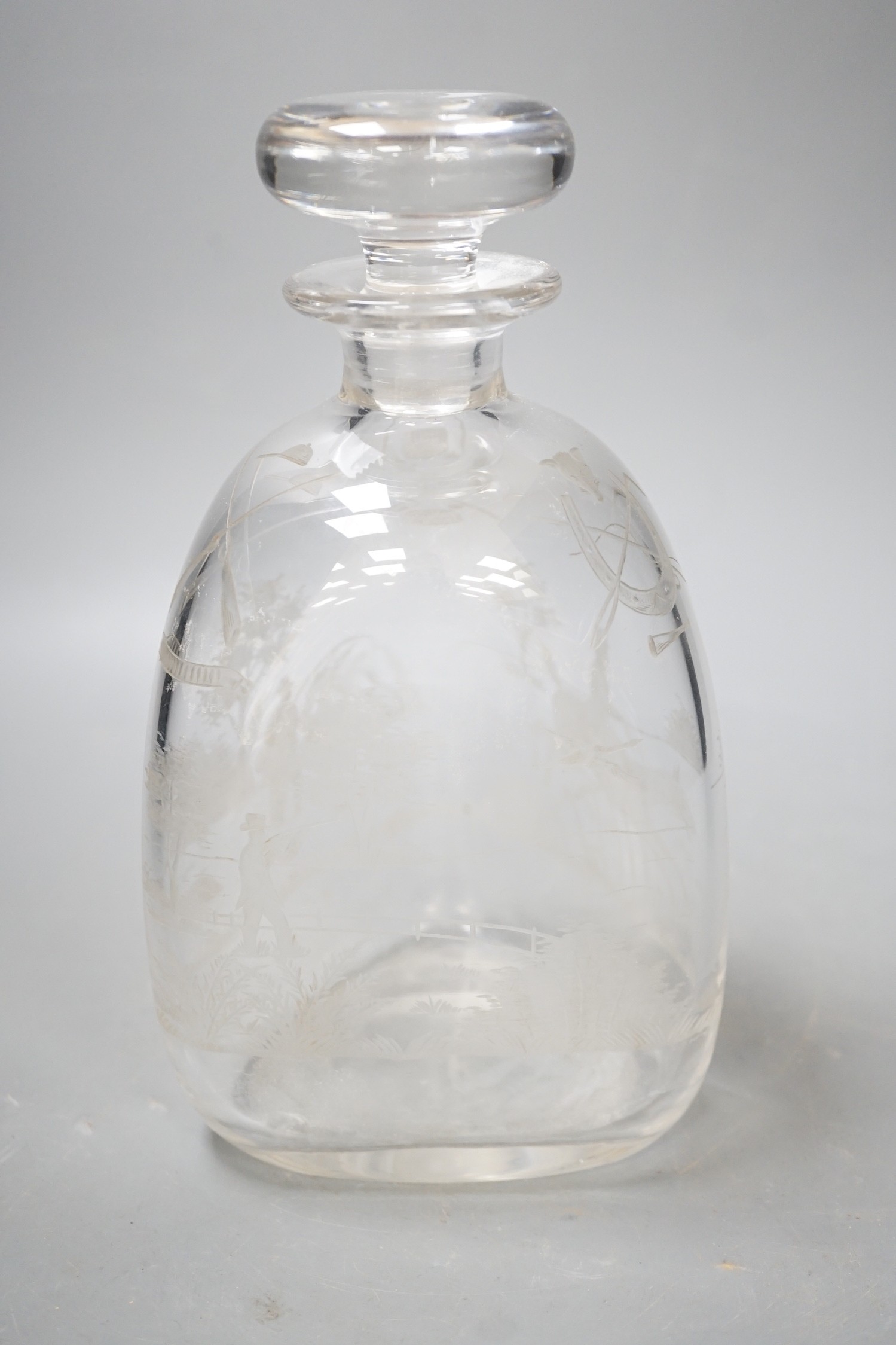 Hunting interest - A Victorian wheel engraved triangular glass decanter, and stopper. 22cm tall